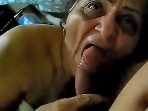 Very Old Brazilian Whore gives a Blowjob