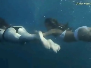 Bikini girls filmed underwater in the ocean