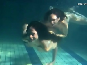 Underwater workout and fun with two beauties