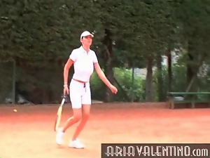 Aria Valentino plays tennis outdoors