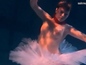 Ballerina in a tutu filmed underwater