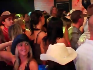 Watch hot chicks dance on the bar