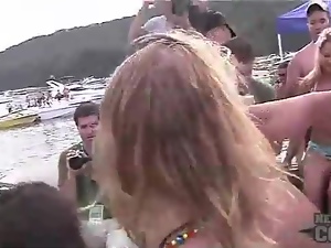 Girls on a boat shake asses in bikinis