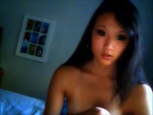 Asian girl naked and masturbating