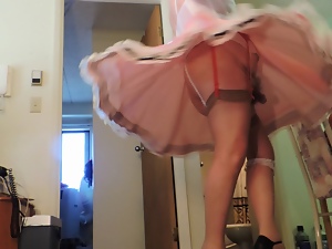 Sissy Ray Twirling in pink sissy dress for Mike