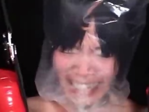 Bagged Girl Panics in Breathplay