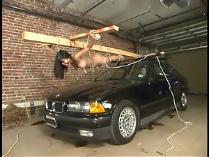 Mika Tan gets lies on a car hood and gets punished