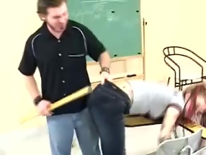 Sexy redhead teen's spanked by her teacher in class