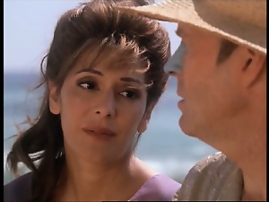 Marina Sirtis sexy on the beach showing us her great