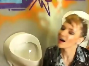 Gloryhole fetish soaked bitch gets bukkake