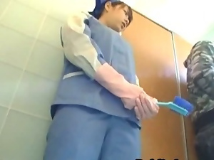 Asian toilet attendant cleans wrong