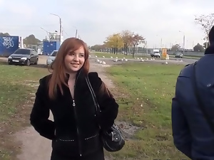 Busty redhead blowjob in a park