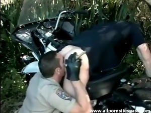 Hot cops rimming and sucking cock outdoors