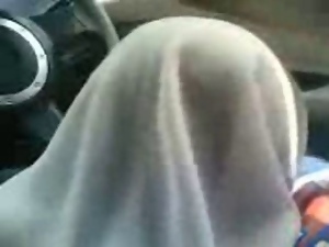 Malay girl Hijab Scarf  Blowjob inside a car
