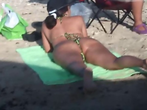 two mature women starting the year on the beach