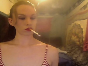 Mature Tmilf enjoying a strong cigarette