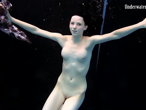 Teens swim and strip nude in underwater video