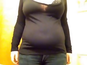 Big beautiful woman Squeezes Plumper Belly Into Jeans
